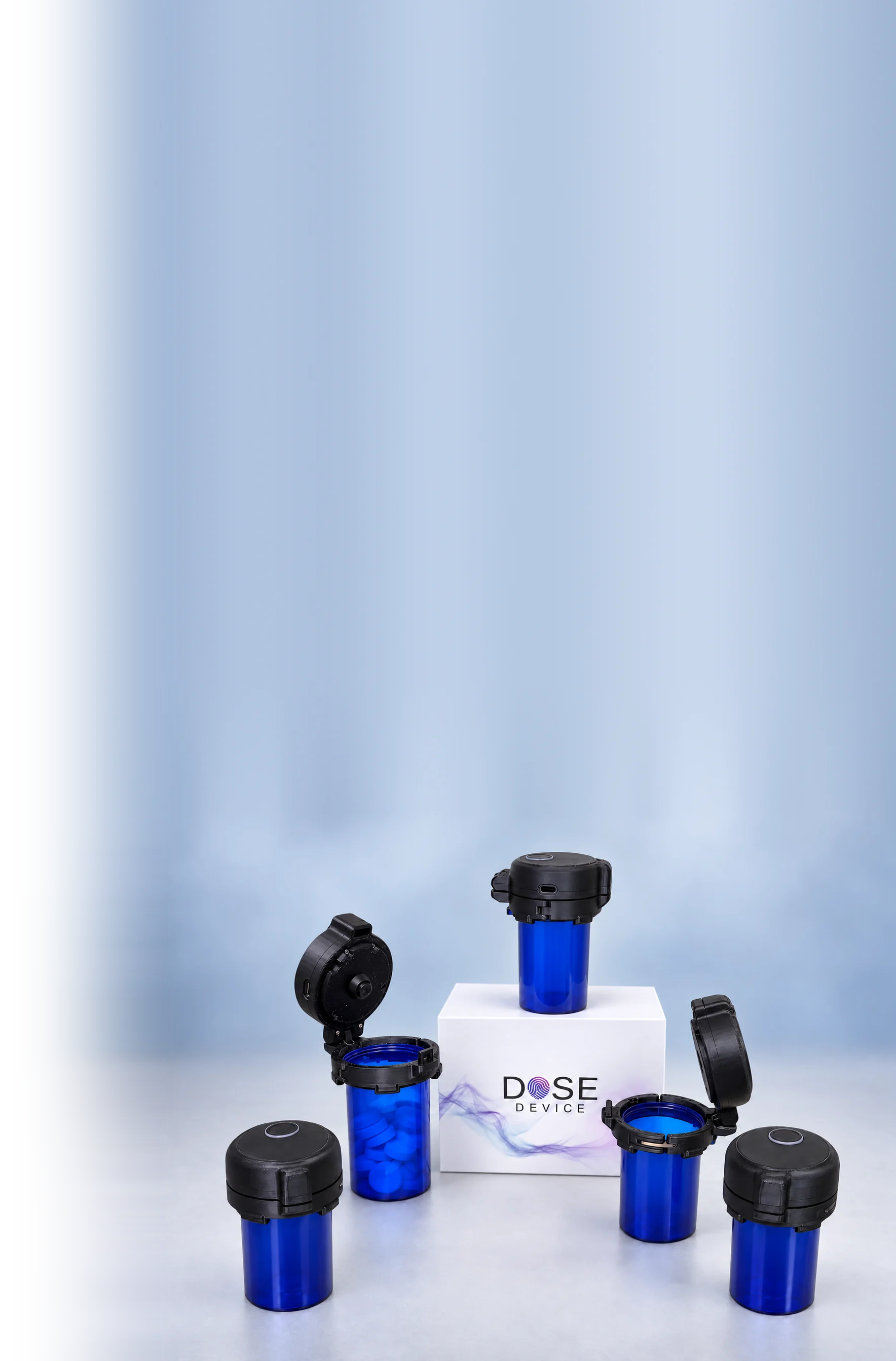Five DOSE Devices, open and closed, around the DOSE Device box